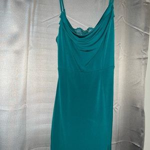 Blue/ Green mini dress with a slit.